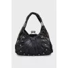 Leather bag with silver decor