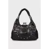 Leather bag with silver decor