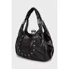 Leather bag with silver decor