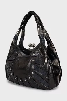 Leather bag with silver decor