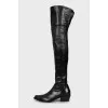 Leather over the knee boots with a beveled heel