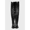 Leather over the knee boots with a beveled heel