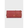 Leather clutch with brand logo