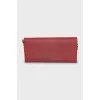 Leather clutch with brand logo