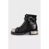 Leather boots with metal decor