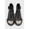 Leather boots with metal decor