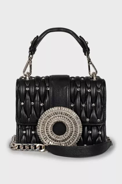 Leather bag decorated with crystals