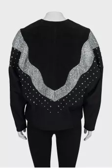 Jacket decorated with sequins