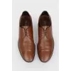 Lace-up leather shoes