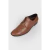 Lace-up leather shoes