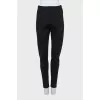 Tapered trousers with zippers on the sides