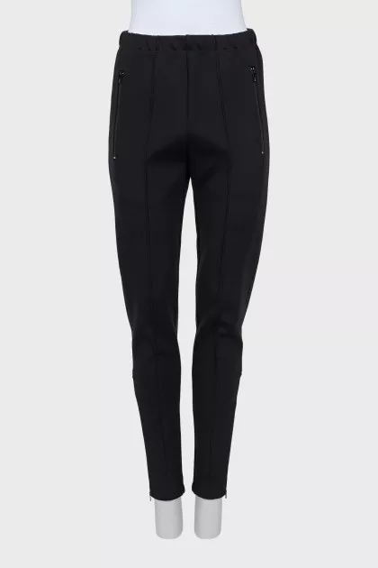 Tapered trousers with zippers on the sides