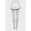 Shorts with accent buckle