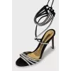 Lace-up sandals decorated with rhinestones