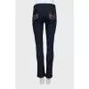 Skinny jeans decorated with rhinestones