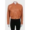 Brown bomber jacket with buttons
