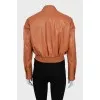 Brown bomber jacket with buttons