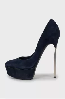 Blue suede shoes with a figured heel