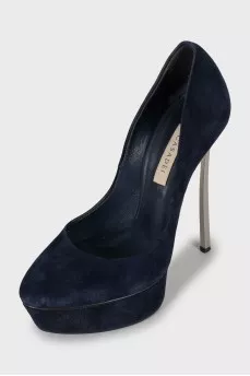 Blue suede shoes with a figured heel