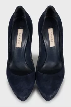 Blue suede shoes with a figured heel
