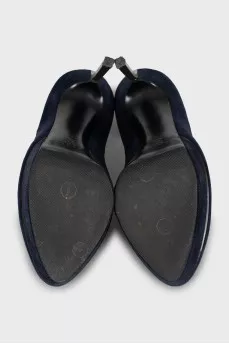 Blue suede shoes with a figured heel