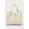 Leather bag with carabiner clasp