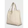 Leather bag with carabiner clasp