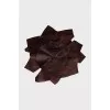 Brooch made of textile and leather