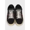 Suede sneakers decorated with stars