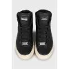Leather sneakers with signature print