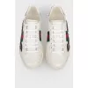 White leather sneakers with colored inserts