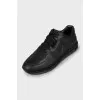 Black leather sneakers