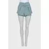 Blue shorts with belt