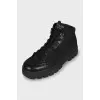 Men's black boots with a massive sole
