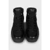 Men's black boots with a massive sole
