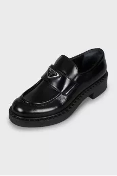 Leather loafers with silver logo