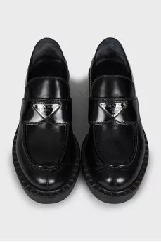 Leather loafers with silver logo