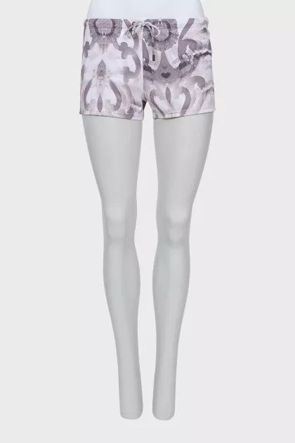 Swim shorts with ties and tag