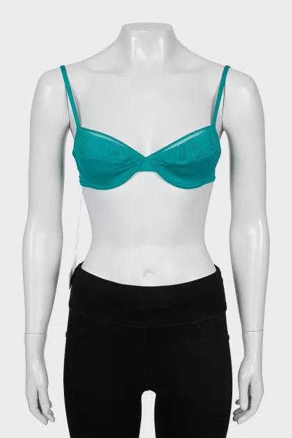 Green swimsuit with tag