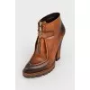 Brown boots with rough soles
