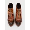 Brown boots with rough soles