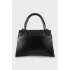 Hourglass leather bag