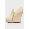 Beige Leather Wedge Pumps