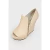 Beige Leather Wedge Pumps