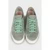 Green textile sneakers