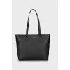 Black tote bag with brand logo