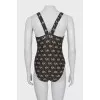 Swimsuit with branded monogram with tag