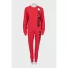 Red sports suit with print
