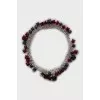 Silver necklace decorated with flowers