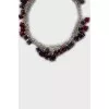 Silver necklace decorated with flowers